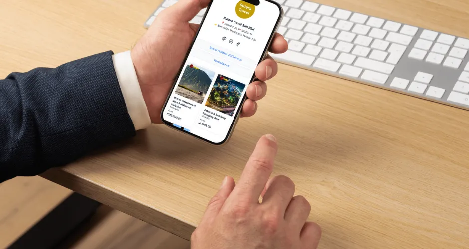 WauHub public page with branded URL for travel agency in Malaysia